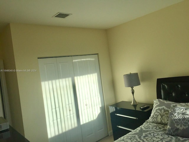 bedroom featuring visible vents