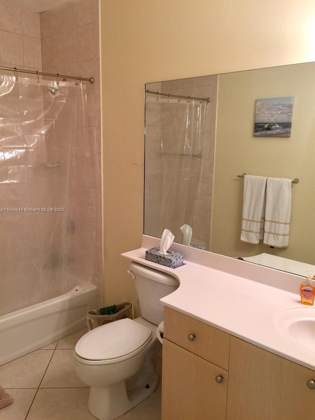 bathroom with vanity, tile patterned flooring, toilet, and shower / tub combo with curtain