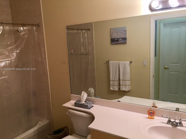 full bath featuring shower / tub combo with curtain, vanity, and toilet