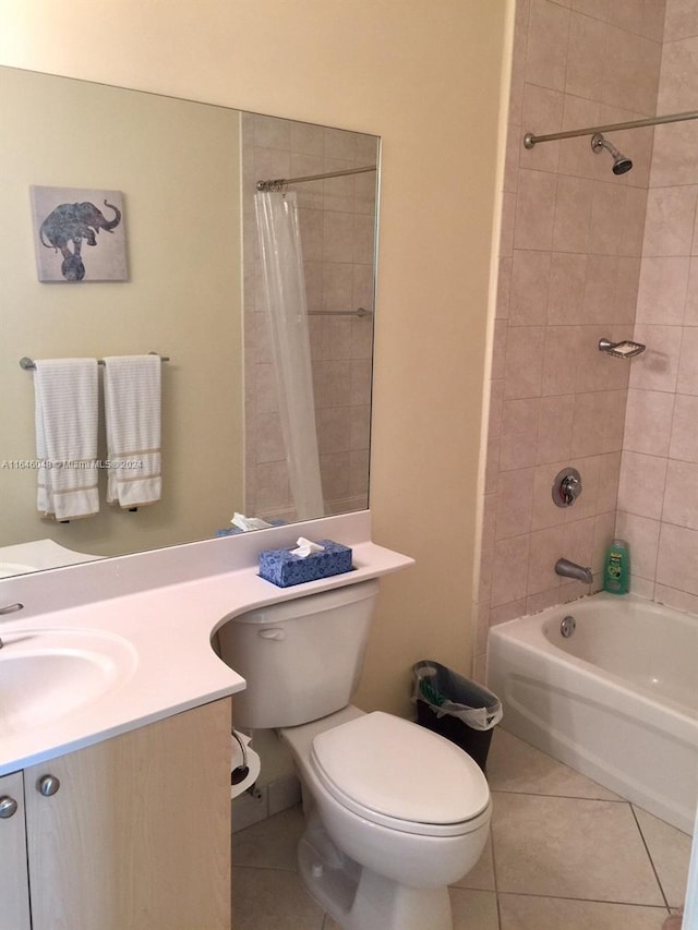 full bathroom with toilet, shower / bath combo, vanity, and tile patterned floors