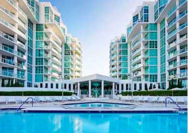 community pool featuring a view of city