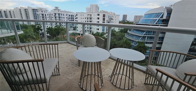 balcony featuring a view of city