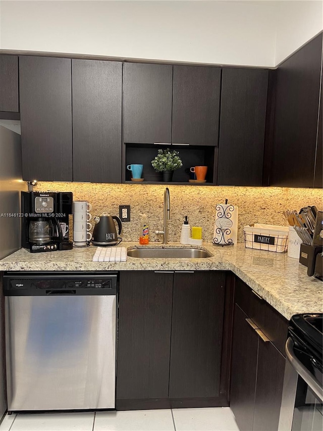 kitchen featuring open shelves, stainless steel appliances, tasteful backsplash, a sink, and modern cabinets