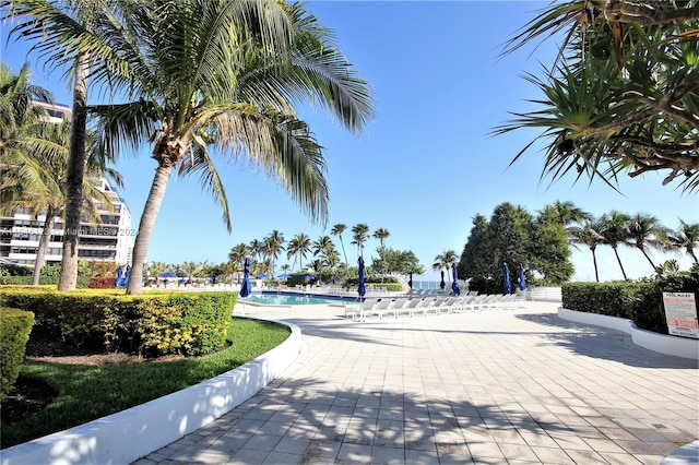 view of home's community featuring a pool