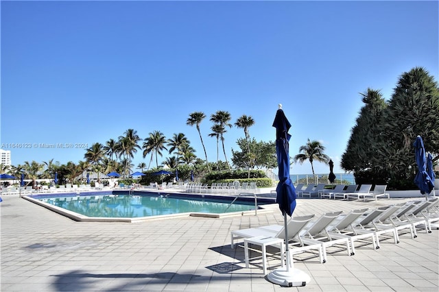 pool with a patio area