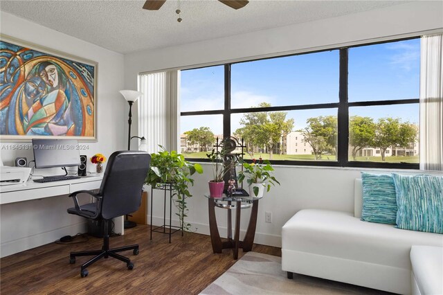 10207 Sunrise Lakes Blvd Unit 203, Sunrise, FL 33322 - home office featuring wood finished floors, healthy amount of natural light, a textured ceiling, and ceiling fan