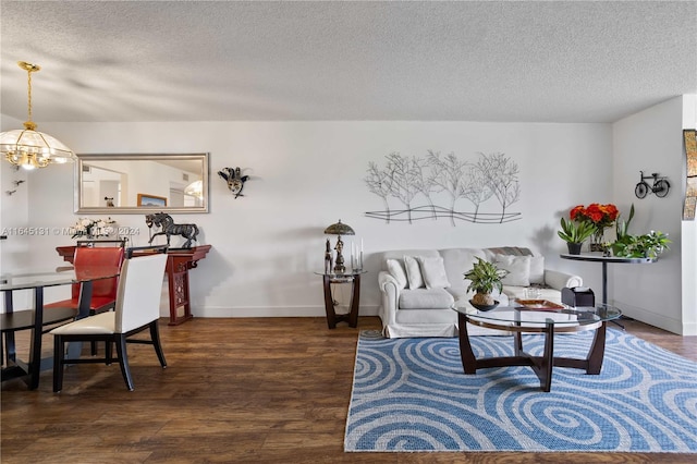 10207 Sunrise Lakes Blvd Unit 203, Sunrise, FL 33322 - living area with a chandelier, wood finished floors, and a textured ceiling