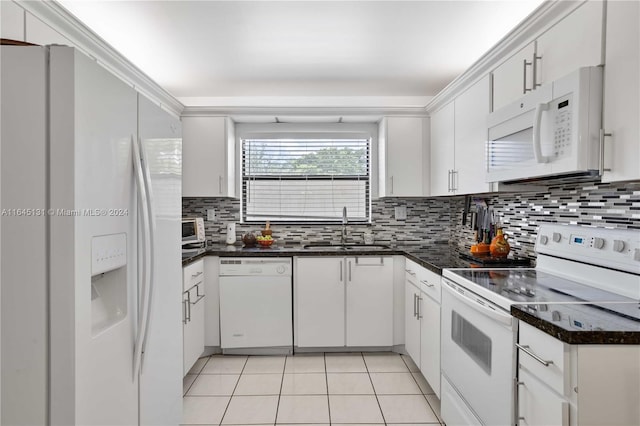 10207 Sunrise Lakes Blvd Unit 203, Sunrise, FL 33322 - kitchen with white appliances, backsplash, white cabinets, light tile patterned floors, and ornamental molding