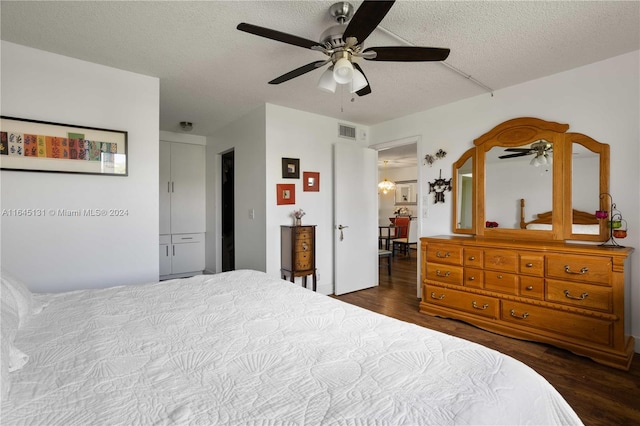 10207 Sunrise Lakes Blvd Unit 203, Sunrise, FL 33322 - bedroom with wood finished floors, a textured ceiling, and ceiling fan