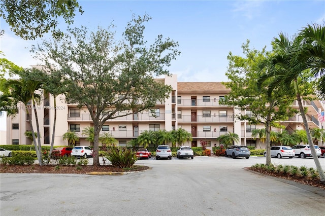 10207 Sunrise Lakes Blvd Unit 203, Sunrise, FL 33322 - view of apartment building / complex with uncovered parking