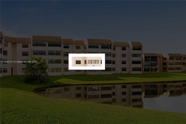 10207 Sunrise Lakes Blvd Unit 203, Sunrise, FL 33322 - view of apartment building / complex with a water view