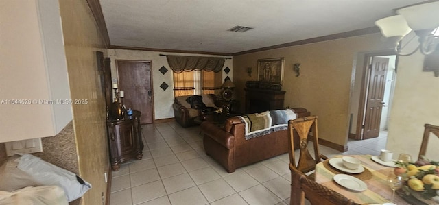 living room with light tile patterned floors and ornamental molding