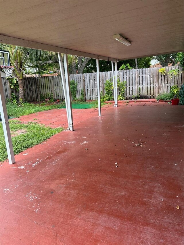 9136 NW 192nd Ter, Hialeah, FL 33018 - fenced backyard featuring a patio