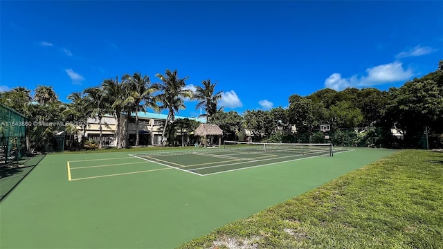 87200 Overseas Hwy Unit M4, Islamorada, FL 33036 - view of tennis court featuring community basketball court and fence