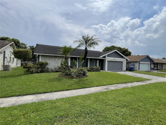 single story home featuring a garage, a front lawn, and central AC