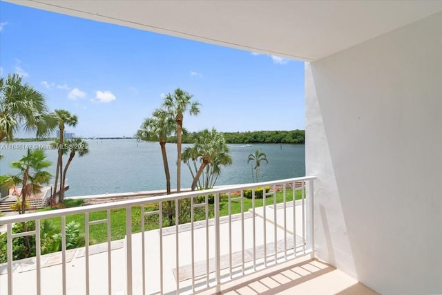 balcony featuring a water view