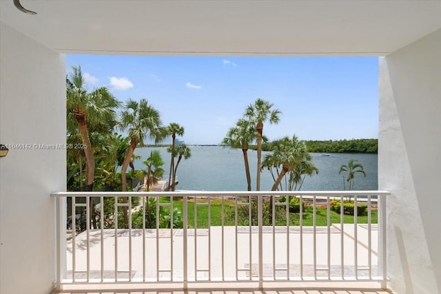 balcony featuring a water view