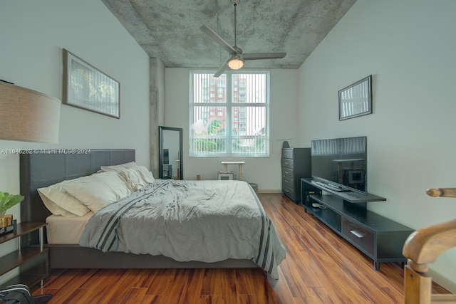 bedroom featuring wood-type flooring and ceiling fan