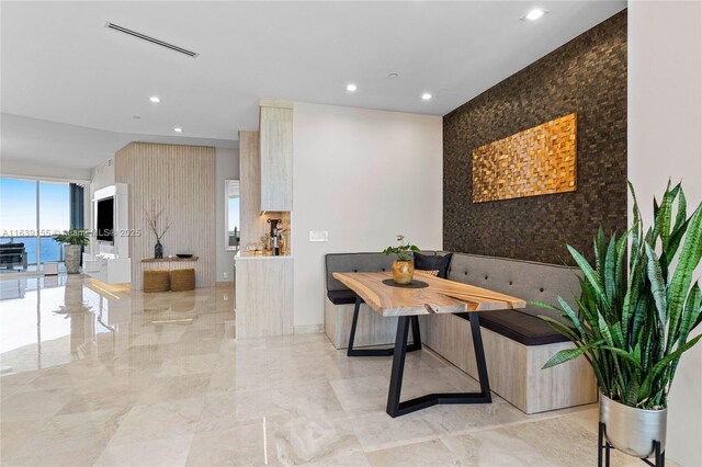 interior details featuring decorative backsplash