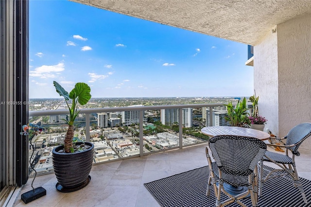 balcony featuring a view of city
