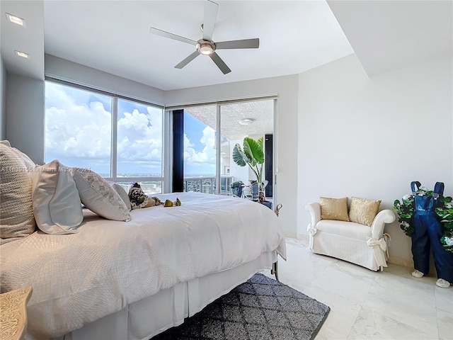 bedroom with access to exterior and ceiling fan