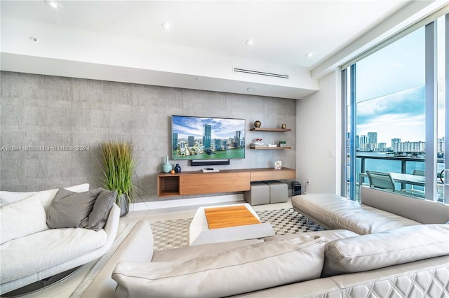 living room with recessed lighting and visible vents