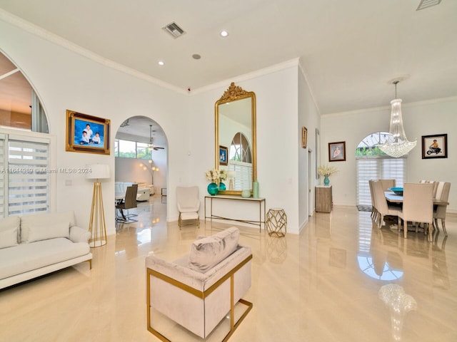 175 SW 132nd Ave, Miami, FL 33184 - living area with ornamental molding, arched walkways, light tile patterned flooring, recessed lighting, and baseboards
