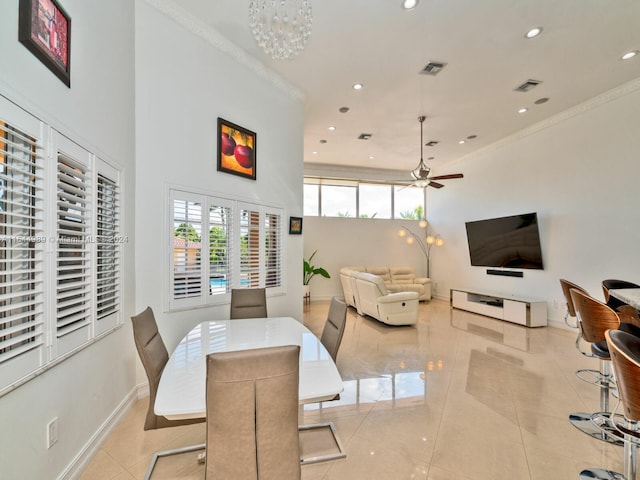 175 SW 132nd Ave, Miami, FL 33184 - dining area with light tile patterned flooring, recessed lighting, a ceiling fan, a high ceiling, and crown molding