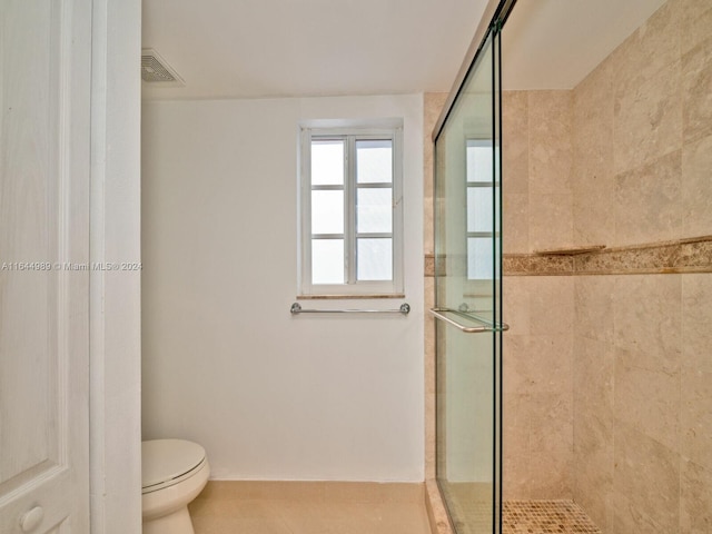 175 SW 132nd Ave, Miami, FL 33184 - full bathroom featuring a shower stall, toilet, and tile patterned flooring