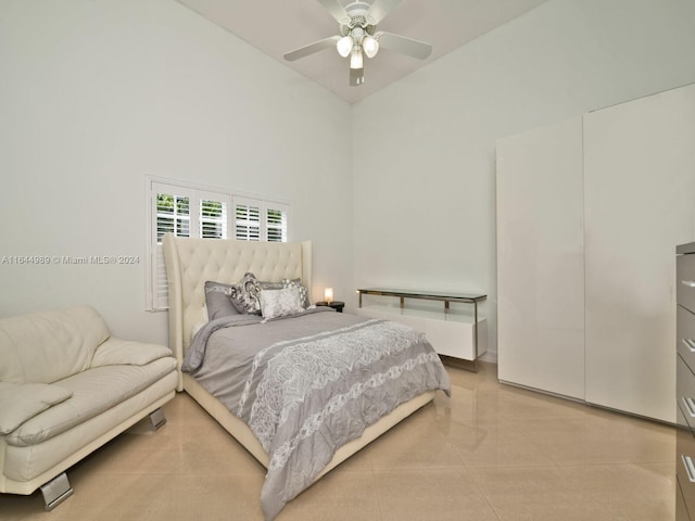 175 SW 132nd Ave, Miami, FL 33184 - bedroom with a towering ceiling, a ceiling fan, and light tile patterned floors