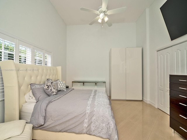 175 SW 132nd Ave, Miami, FL 33184 - bedroom featuring light tile patterned flooring, high vaulted ceiling, a ceiling fan, and a closet