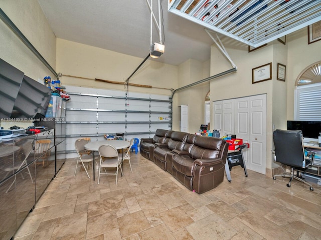175 SW 132nd Ave, Miami, FL 33184 - garage featuring a garage door opener and a desk