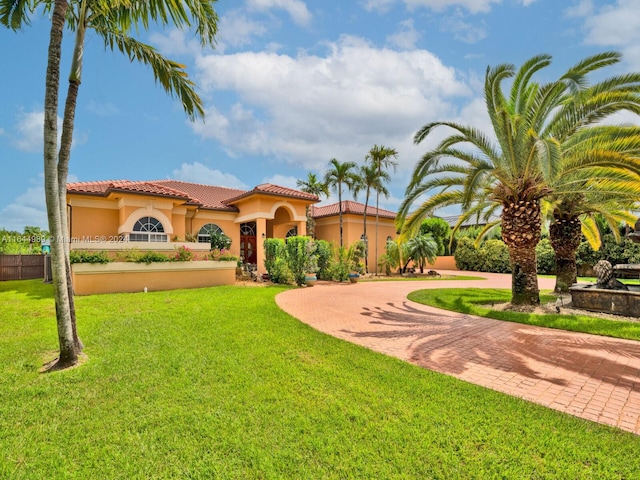 175 SW 132nd Ave, Miami, FL 33184 - mediterranean / spanish house with stucco siding, a tile roof, and curved driveway
