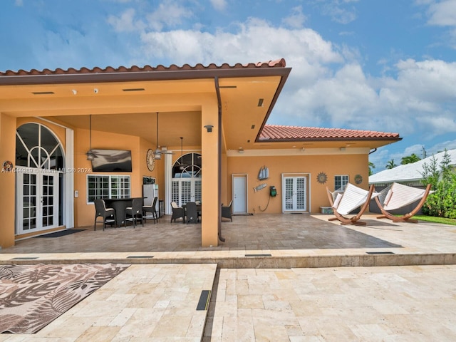 175 SW 132nd Ave, Miami, FL 33184 - back of house with french doors, a patio area, and a tile roof