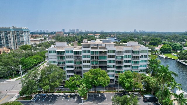 view of building exterior with a water view