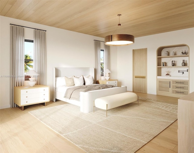 bedroom featuring wood ceiling and light hardwood / wood-style floors