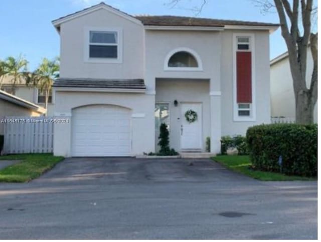 view of property featuring a garage