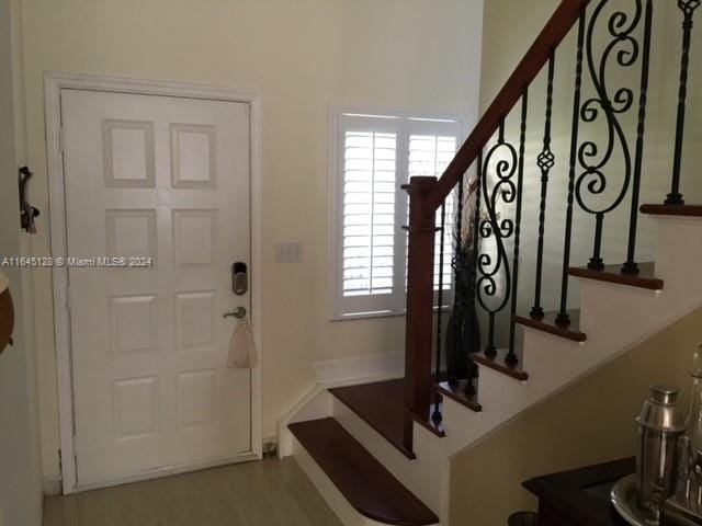 foyer entrance featuring a wealth of natural light