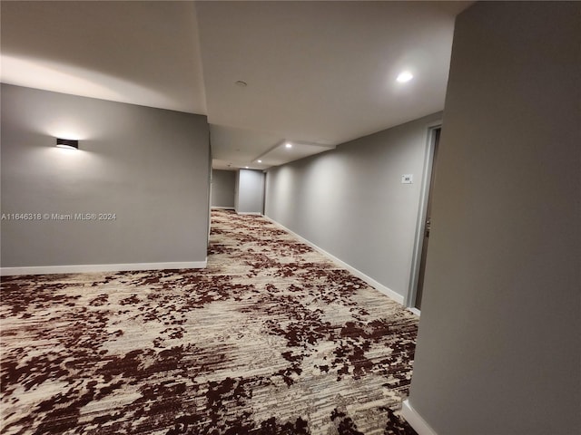 2555 Collins Ave Unit 306, Miami Beach, FL 33140 - finished basement featuring carpet flooring, baseboards, and recessed lighting