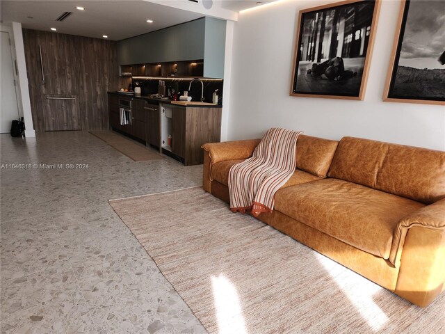 2555 Collins Ave Unit 306, Miami Beach, FL 33140 - living area with bar with sink and recessed lighting