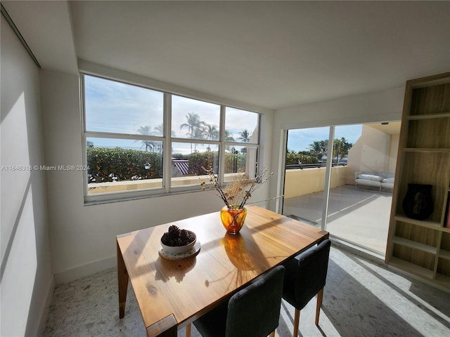 2555 Collins Ave Unit 306, Miami Beach, FL 33140 - dining room with baseboards