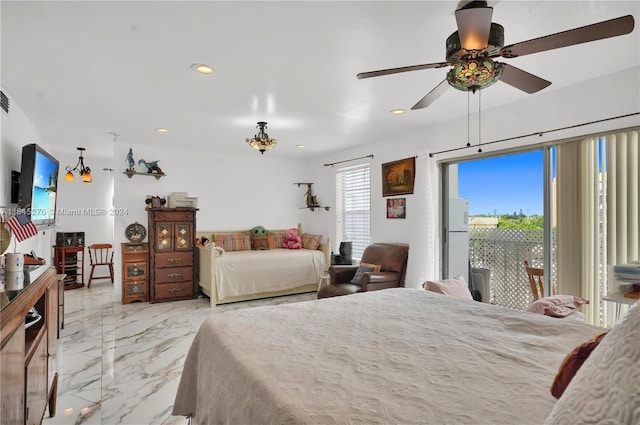 bedroom featuring white refrigerator, access to outside, and ceiling fan