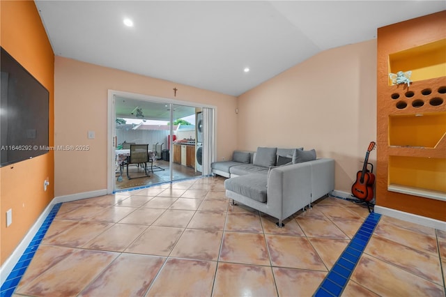 living room with vaulted ceiling and tile patterned floors