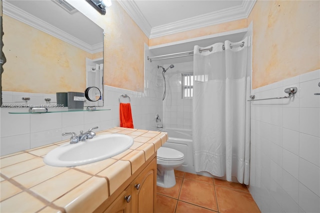 full bathroom featuring shower / tub combo with curtain, tile walls, ornamental molding, toilet, and tile patterned floors