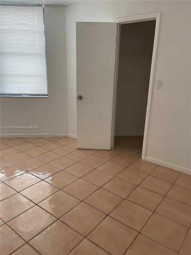 view of tiled spare room