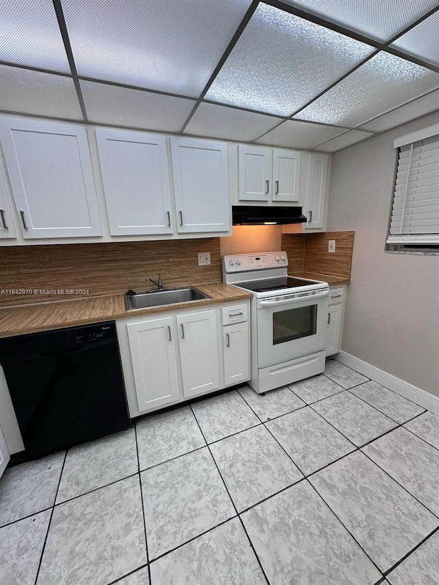 kitchen featuring electric stove, a sink, white cabinetry, under cabinet range hood, and black dishwasher