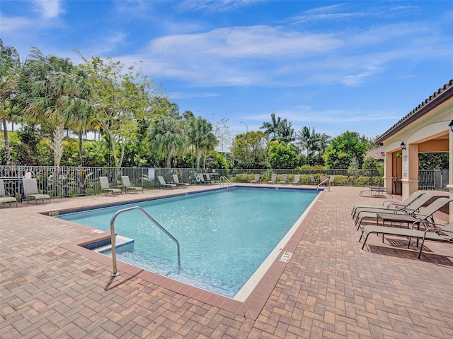 view of pool featuring a patio area