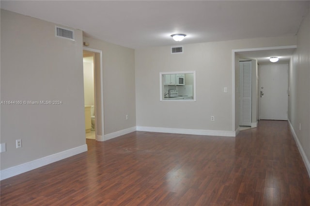 empty room featuring hardwood / wood-style floors