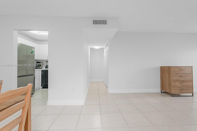 interior space featuring light tile patterned flooring