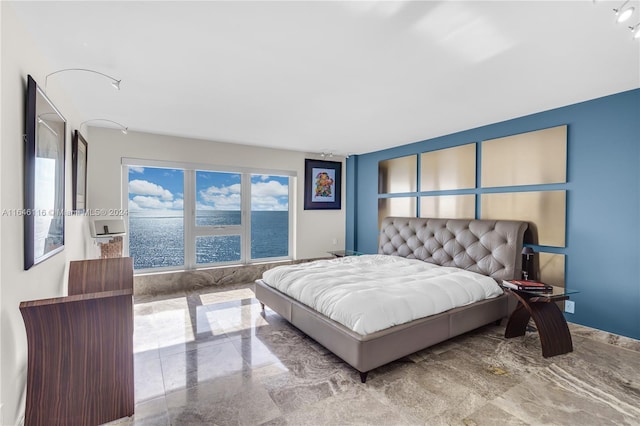 bedroom with marble finish floor